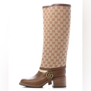 Never worn knee high Gucci Riding boots.